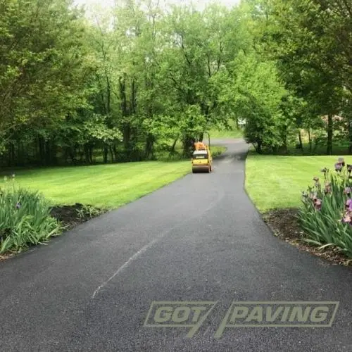 tar and chip be installed over an existing asphalt driveway